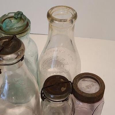 Lot 235: Antique Bottles/Jars ( Borden purple, Coleman Dairy, Whitman VT) 