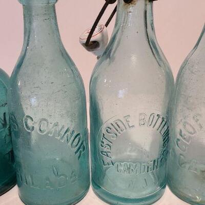 Lot 197: Blue Local Blob Top Soda Bottles ( Mullen, Conner, Eastside, Feiffer)