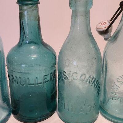 Lot 197: Blue Local Blob Top Soda Bottles ( Mullen, Conner, Eastside, Feiffer)
