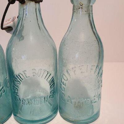 Lot 197: Blue Local Blob Top Soda Bottles ( Mullen, Conner, Eastside, Feiffer)