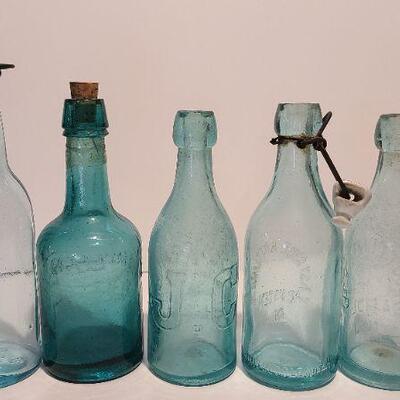 Lot 197: Blue Local Blob Top Soda Bottles ( Mullen, Conner, Eastside, Feiffer)
