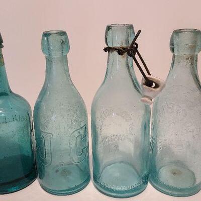 Lot 197: Blue Local Blob Top Soda Bottles ( Mullen, Conner, Eastside, Feiffer)