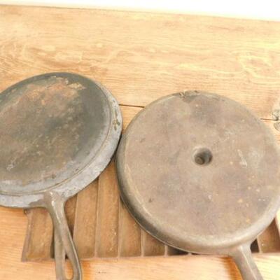 Set of Three Cast Iron Flat Pans and Corn Crib