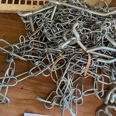Lot 455 - Chains and pegboard hooks