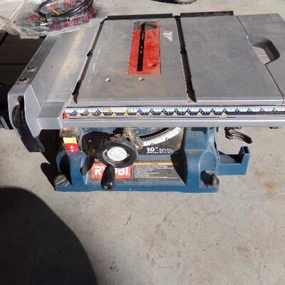 LOT 26  RYOBI 10 INCH TABLE SAW WITH STAND
