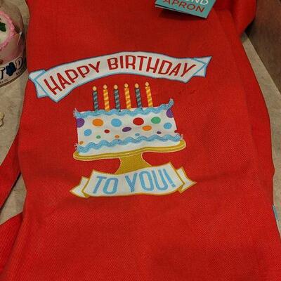 Lot 4: New Light Up Happy Birthday Apron, Plushie and Candle Lot
