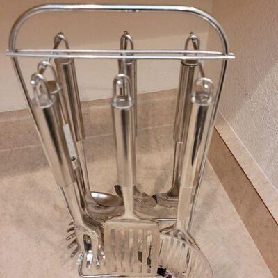 Lot 48: Stainless Kitchen Utensils with Stand