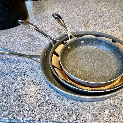 LOT 108  NEW CAST ALUMINUM SKILLET SET J.A. HENCKELS