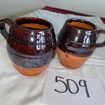 Lot  509- Pottery Mugs