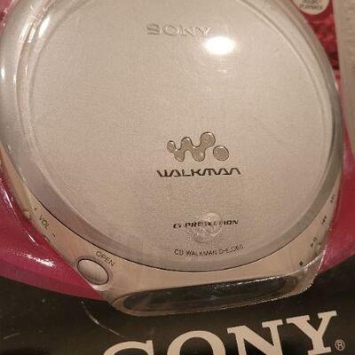 Lot 88: Vintage NEW Sony Bundle - CD Walkman and Car Connection Kit