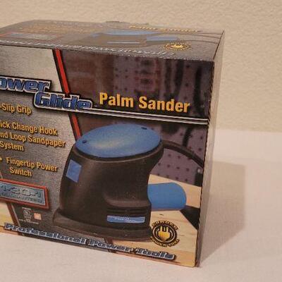 Lot 102: New Power Glide Palm Sander 