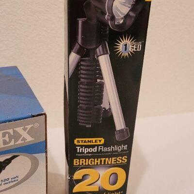 Lot 112: New Electric Pump and Like Nee STANLEY Tripod Flashlight