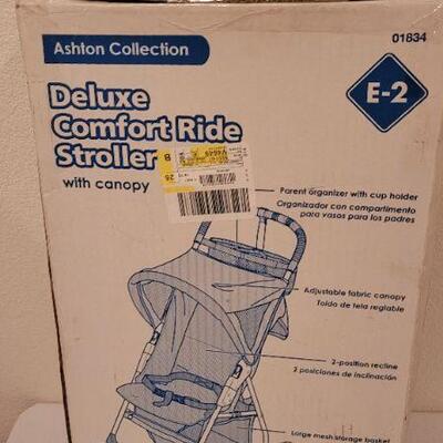 Lot 114: New Deluxe Comfort Ride Stroller by COSCO