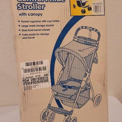 Lot 114: New Deluxe Comfort Ride Stroller by COSCO