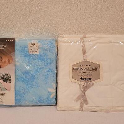 Lot 119: New King Size Flat Sheet (Blue Sky) + 2 Pillowcases by WAMSUTTA