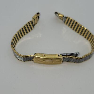 JMO13: Two Vintage copper bracelets and a vintage watch band