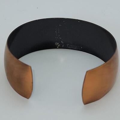 JMO13: Two Vintage copper bracelets and a vintage watch band