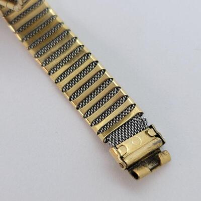 JMO13: Two Vintage copper bracelets and a vintage watch band