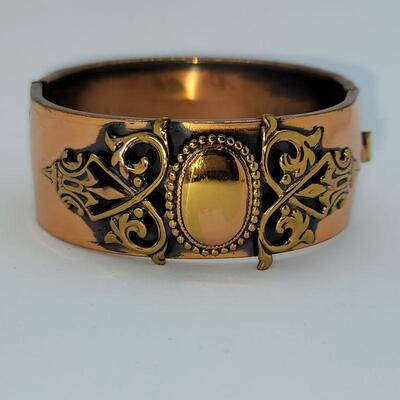 JMO13: Two Vintage copper bracelets and a vintage watch band
