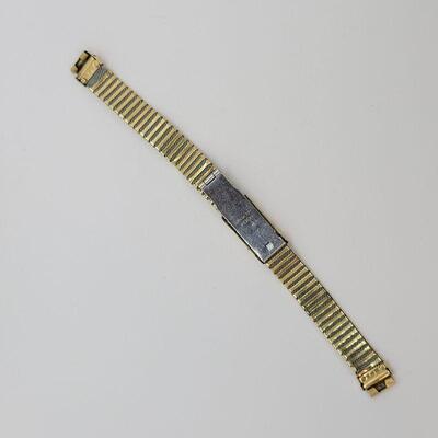 JMO13: Two Vintage copper bracelets and a vintage watch band