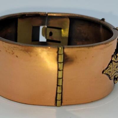 JMO13: Two Vintage copper bracelets and a vintage watch band