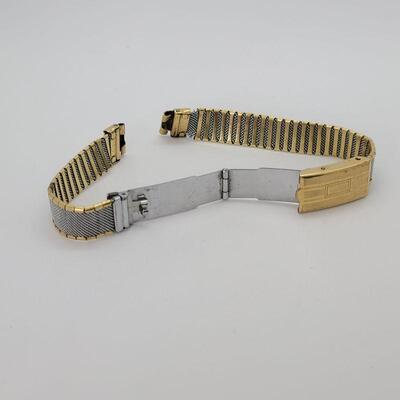 JMO13: Two Vintage copper bracelets and a vintage watch band
