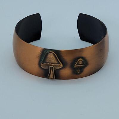JMO13: Two Vintage copper bracelets and a vintage watch band