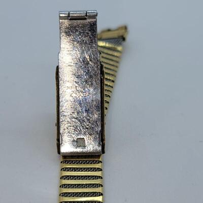 JMO13: Two Vintage copper bracelets and a vintage watch band
