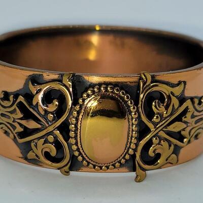 JMO13: Two Vintage copper bracelets and a vintage watch band