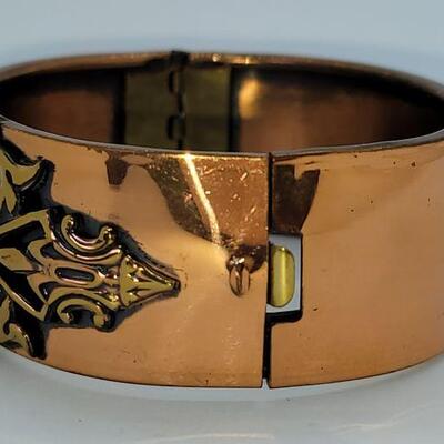 JMO13: Two Vintage copper bracelets and a vintage watch band
