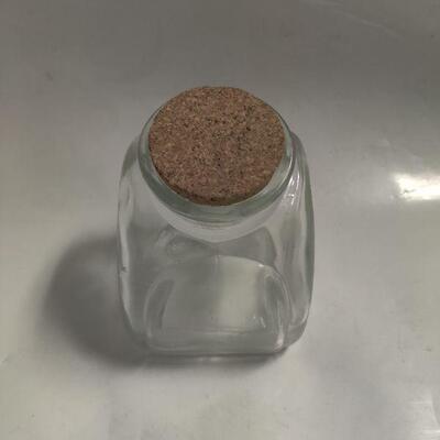 Glass container with cork lid