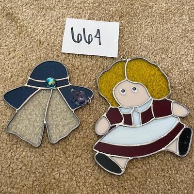 Lot 664 - Stained Glass Doll and hat