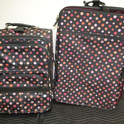 LOT 472 TWO POKA DOT ROLLING SUIT CASES 