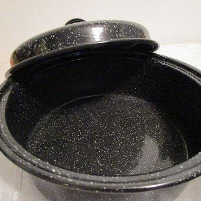 #22 Three metal enamel pans with lids
