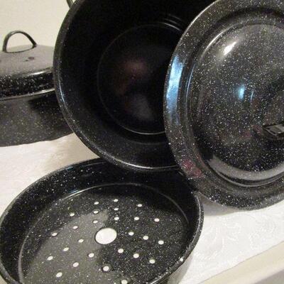 #22 Three metal enamel pans with lids