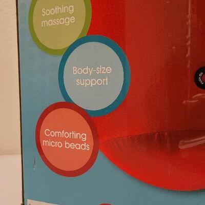 Lot 209: New Large Massaging SQWEEZ Red Body Pillow 