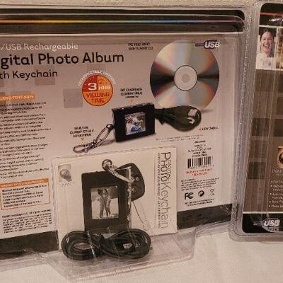 Lot 234: Pair of NEW Digital Keychain Photo Frames