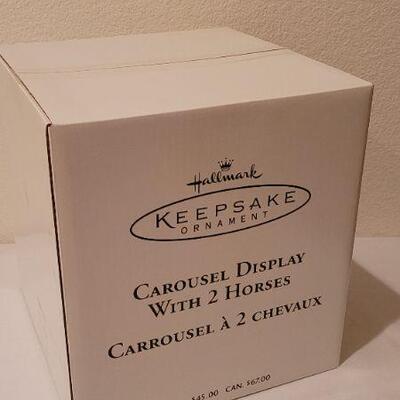 Lot 242: New HALLMARK Carousel Display with 2 Horses
