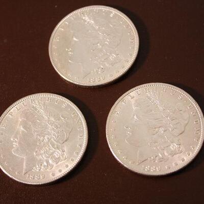 3 1889 Morgan silver dollars