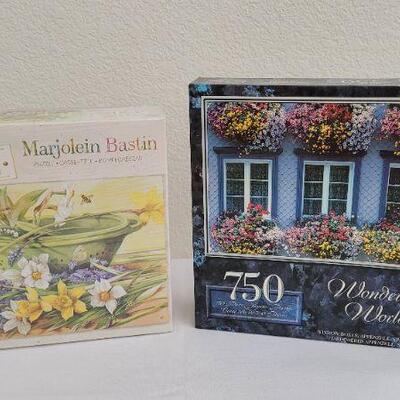 Lot 258: (2) New 750 pc. Whimsical Puzzles
