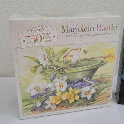 Lot 258: (2) New 750 pc. Whimsical Puzzles
