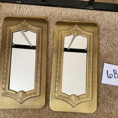 Lot 687 -Two Mirrors with brass frames