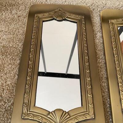 Lot 687 -Two Mirrors with brass frames