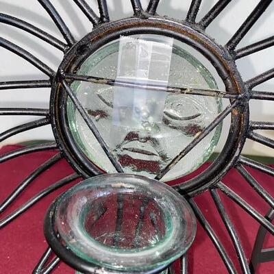 Lot 715 - metal plate racks and sun candle holder