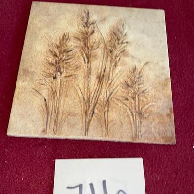 Lot 716- Wheat decorative tile