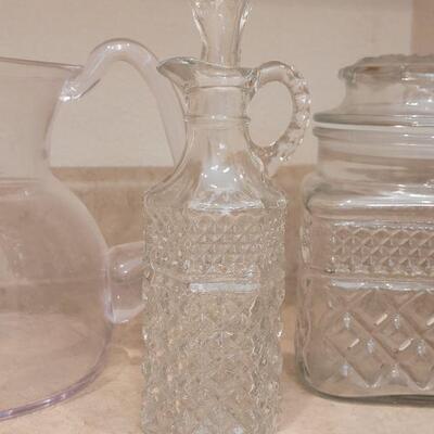 Lot 21: Glass Pitcher, (4) Dessert Bowls, Cut Glass Oil Cruet and Jar