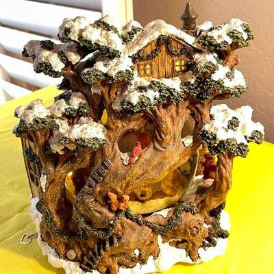 LOT 141  LARGE RESIN SNOWGLOBE SANTA CHECKS HIS LIST FORREST ANIMALS