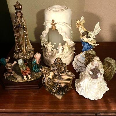 LOT 150  GROUP OF RESIN RELIGIOUS FIGURINES 