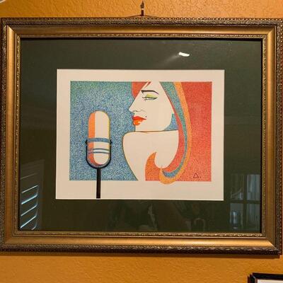 LOT 176  FRAMED LITHOGRAPH LADY WITH A MICROPHONE 