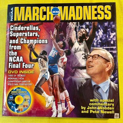 LOT 184  BOOK MARCH MADNESS W/DVD HIGHLIGHTS